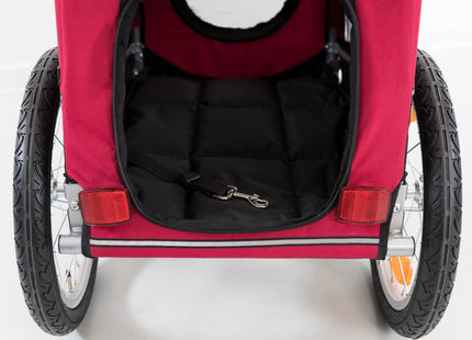 Schwarzer und roter Fahrradanhänger von Trixie für Haustiere